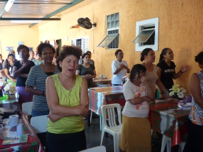 The women of the mountain refuge praying and thanking God for there release from the life on the streets