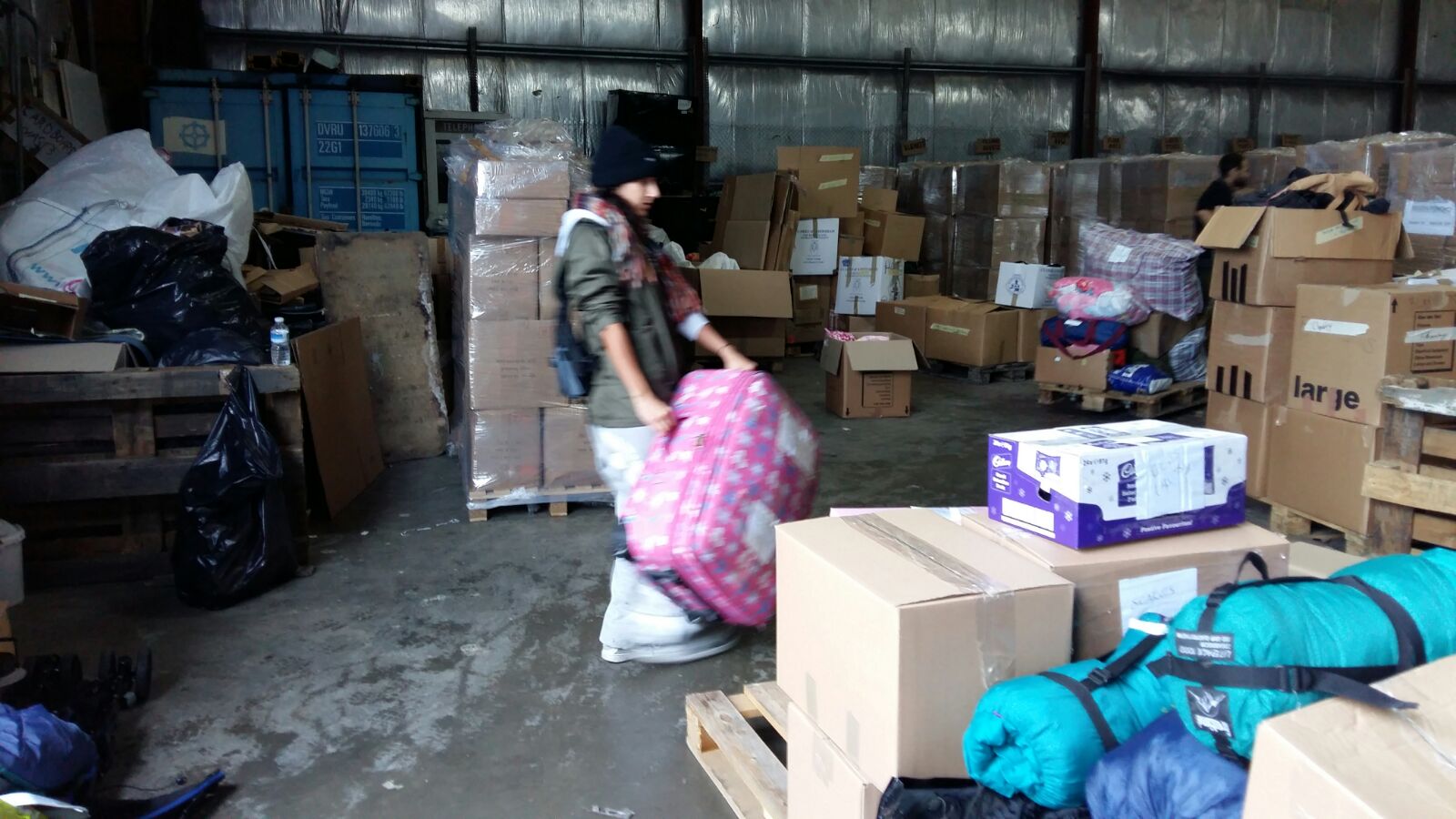 Kizzy is unloading the clothes that she collected
              in Winsford UK