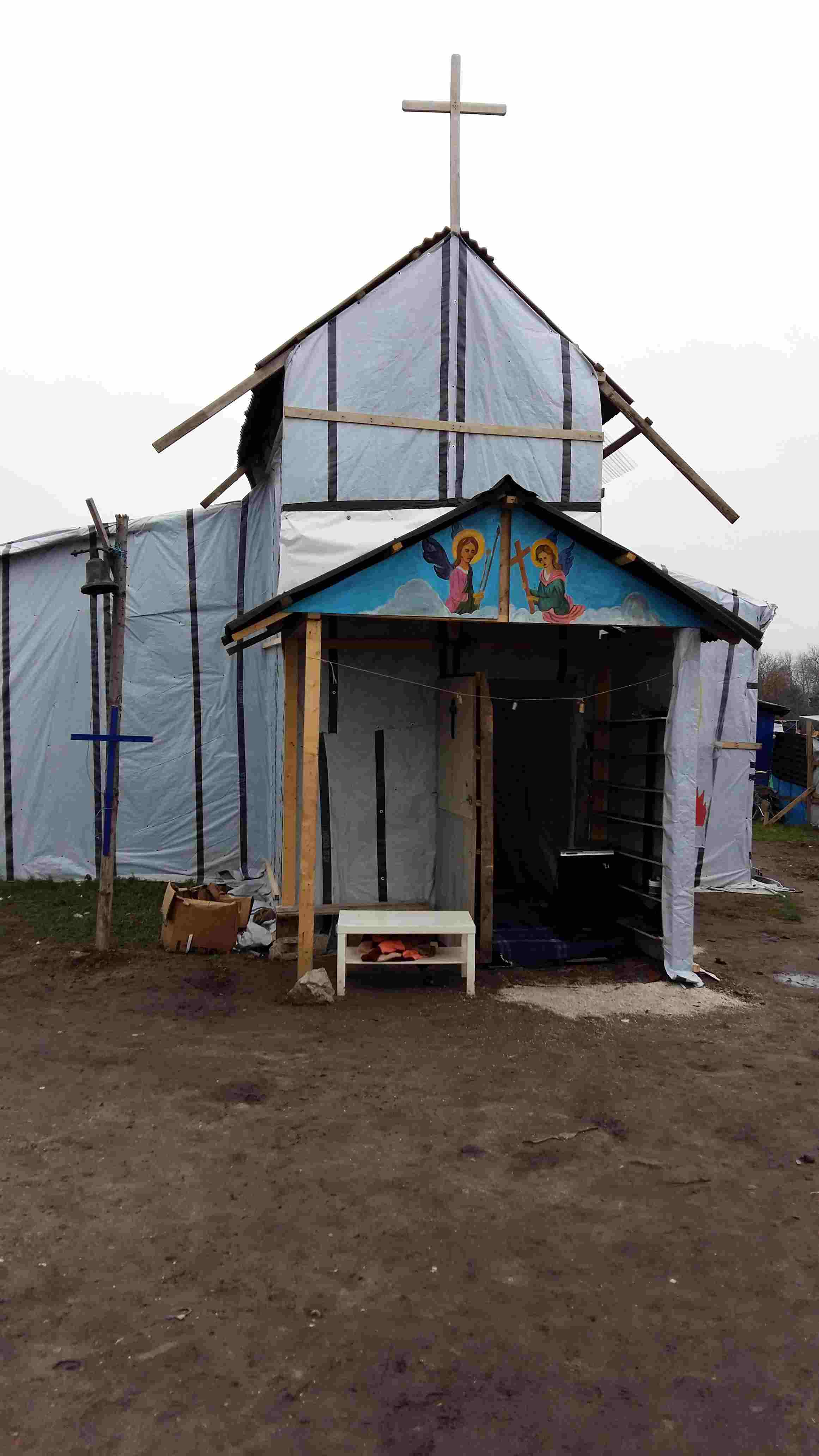 The Syrian refugees built a Church out of boxxes and
        pallets