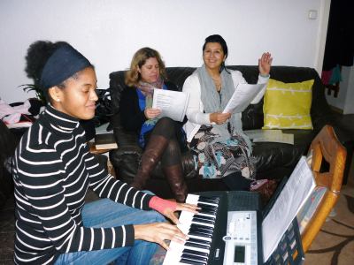 Llliana plays the keyboard, as we sing along