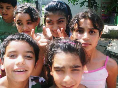 Here the children  are hungary, and waiting eagerly to be fed