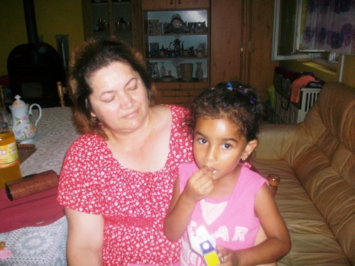 Kati,giving her love to  one of the village children, this is what she is all about,...giving, giving, giving