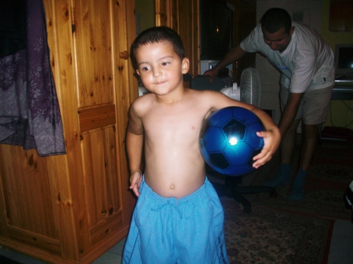 Leonard loves his little ball, now he can practice football with the big boys