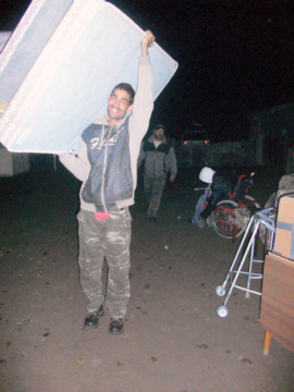 Little Melanie s Father, David, is so happy to at last know that he family can sleep on a bed tonight, with a matress, no wonder he s smiling
