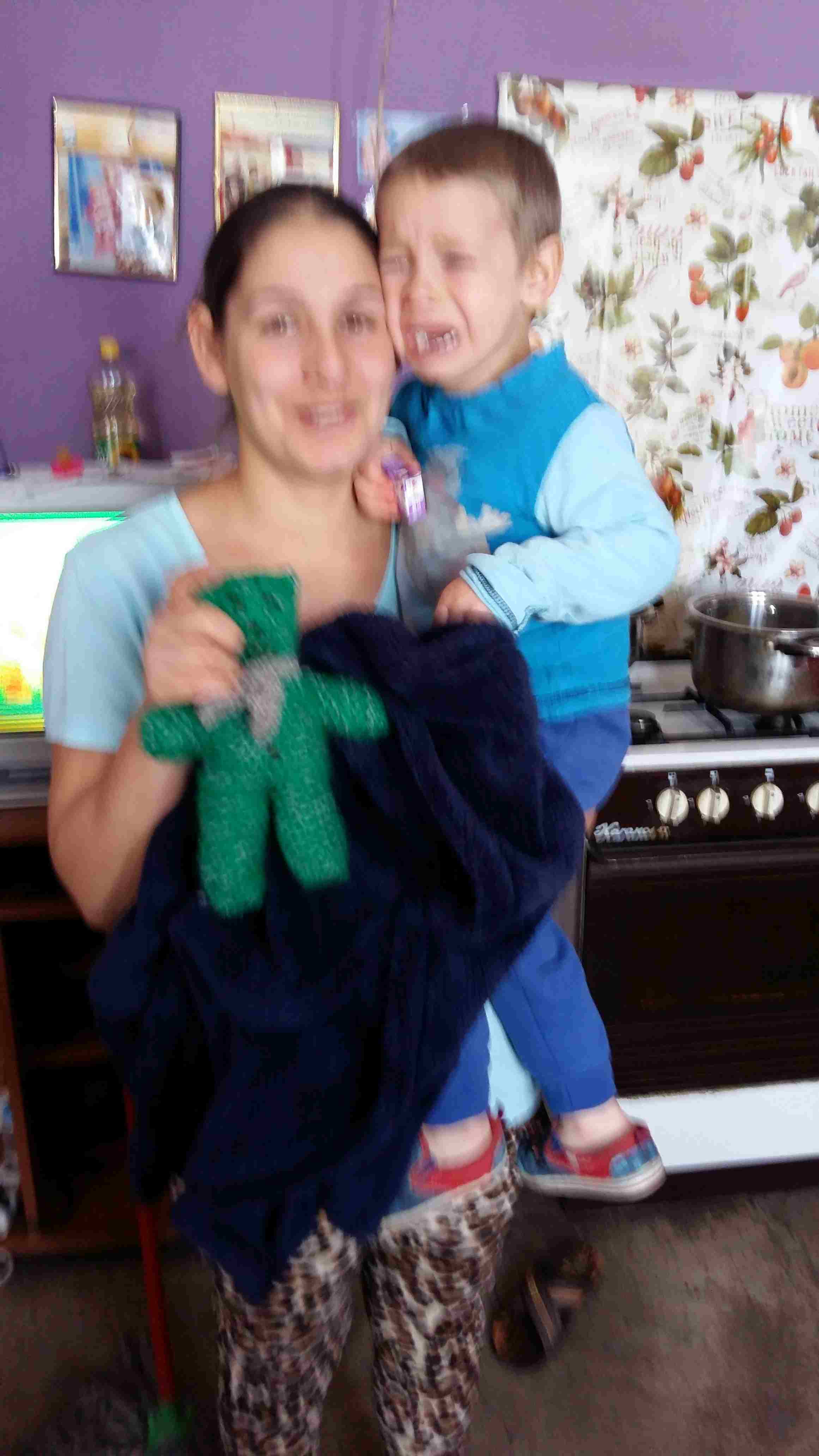 Children recieve toys at train station, in Vogygorky