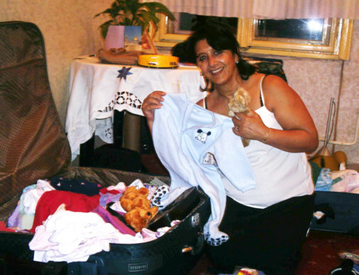 These are some of the baby clothes you gave me. The pic shows me giving them out in Bag, Hungary